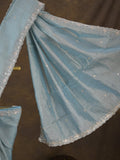 Tissue crush fancy saree light blue color allover motifs & embroidery border with running pallu and printed blouse