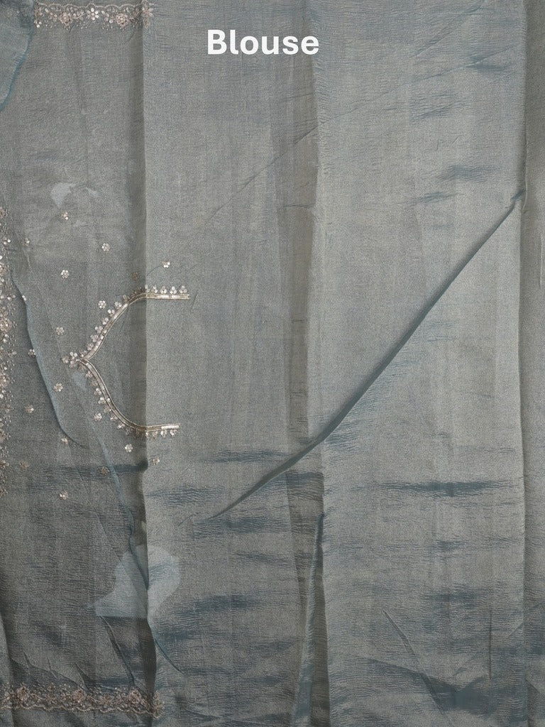 Tissue crush fancy saree light blue color allover motifs & embroidery border with running pallu and printed blouse