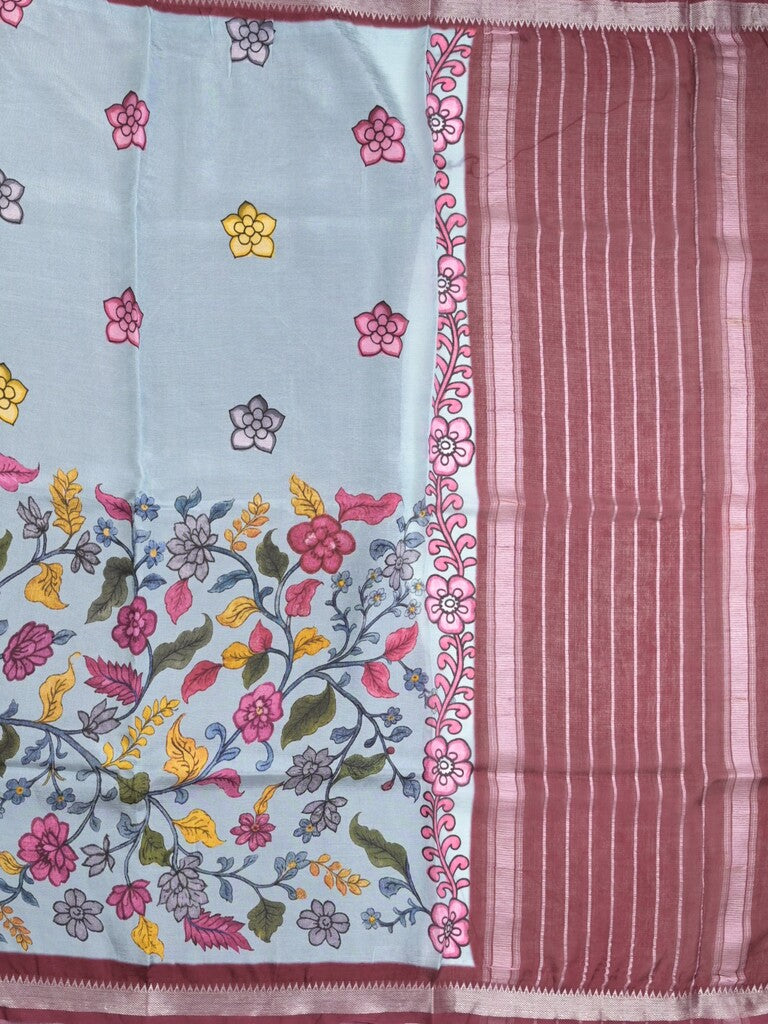 Mangalagiri fancy printed saree in light blue color with zari border and plain contrast blouse