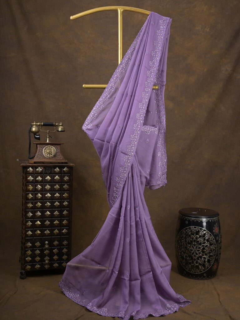 Organza fancy saree lavender color allover embroidered motifs & cutwork border with running pallu and self blouse