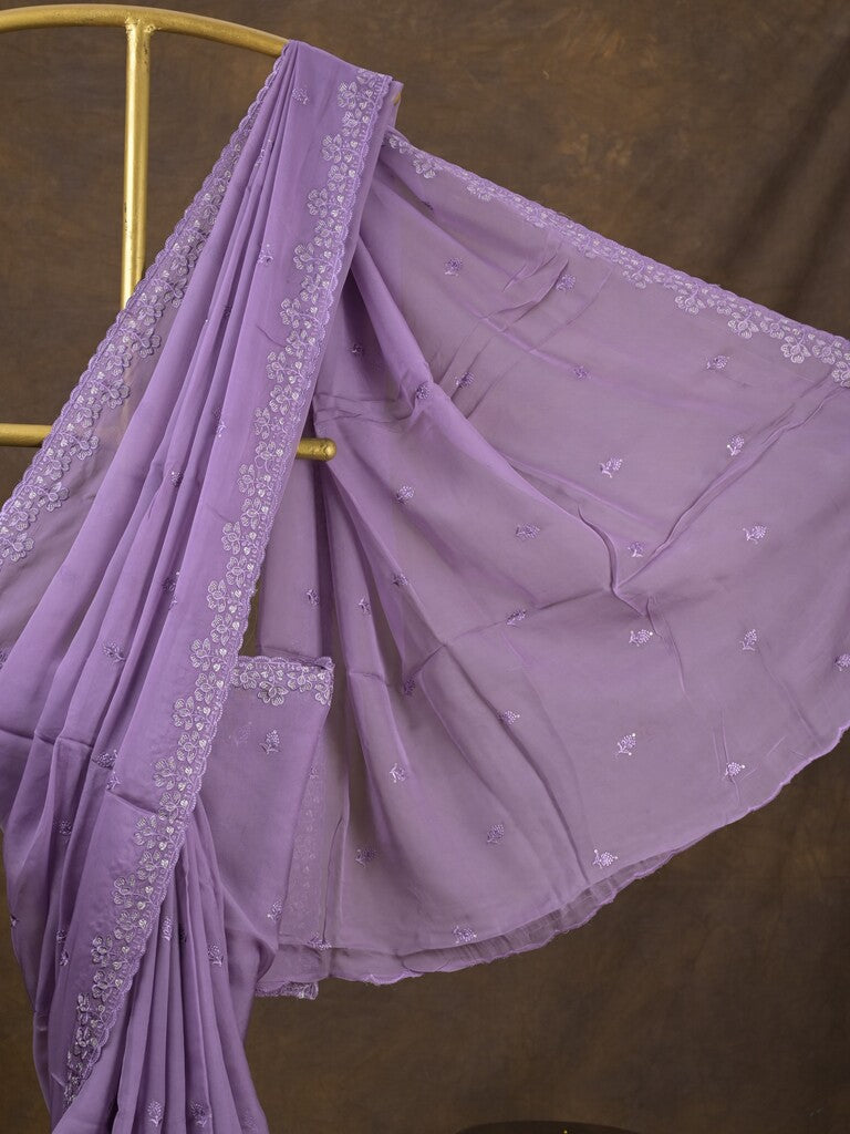 Organza fancy saree lavender color allover embroidered motifs & cutwork border with running pallu and self blouse