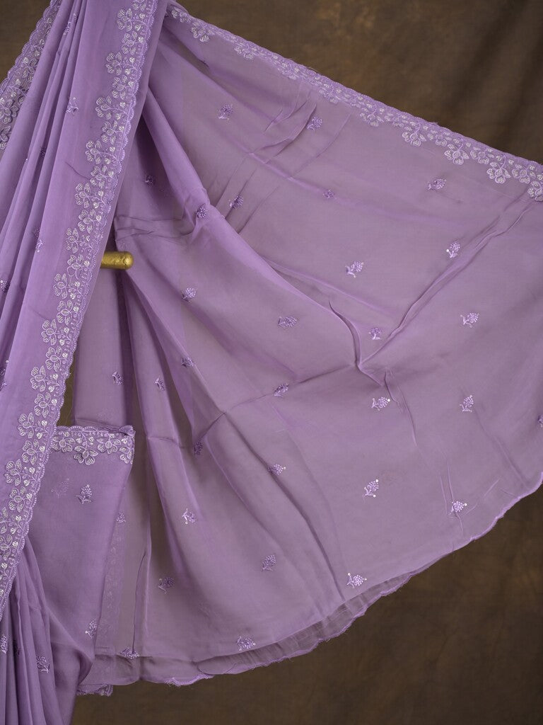 Organza fancy saree lavender color allover embroidered motifs & cutwork border with running pallu and self blouse