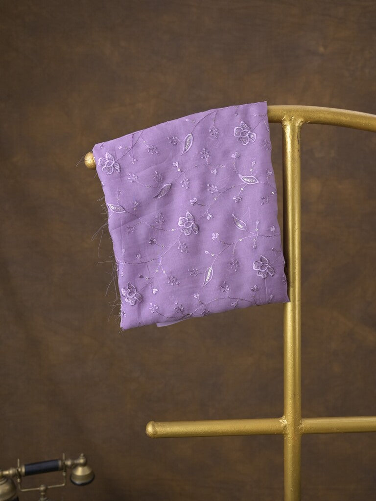 Organza fancy saree lavender color allover embroidered motifs & cutwork border with running pallu and self blouse