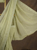 Organza fancy saree light pastel green color allover embroidered motifs & cutwork border with running pallu and self blouse