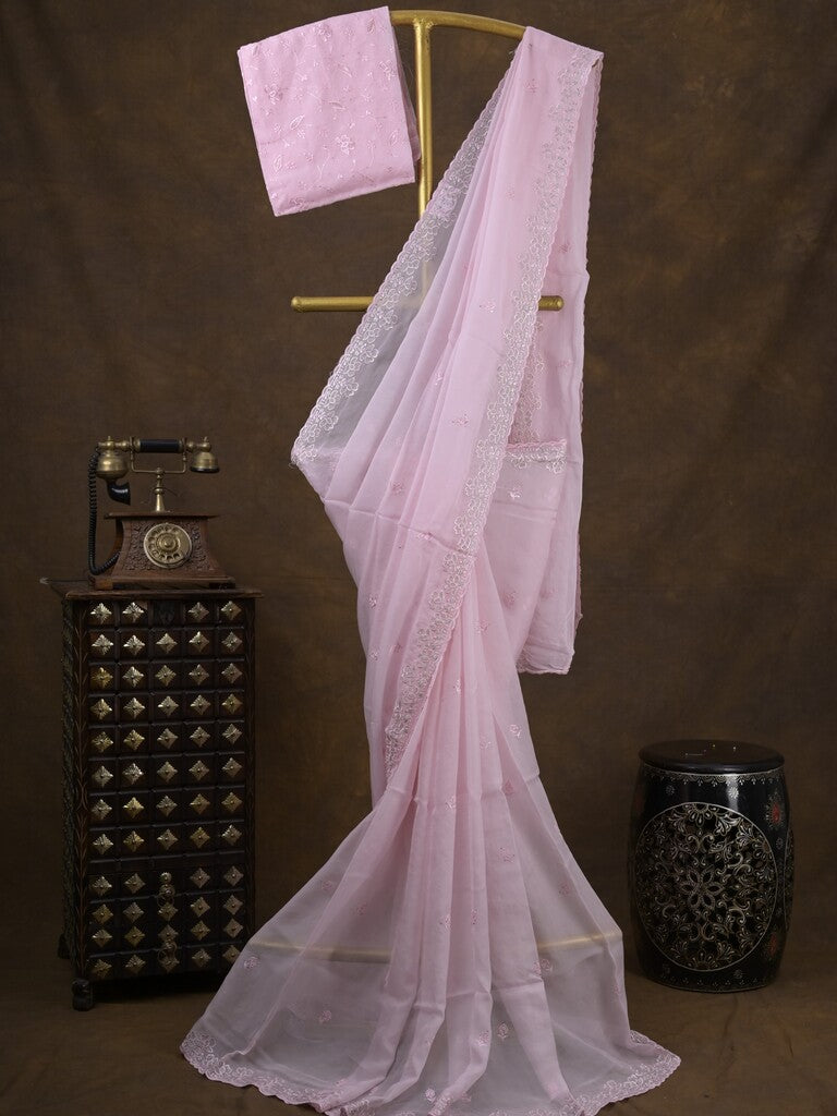 Organza fancy saree light pastel purple color allover embroidered motifs & cutwork border with running pallu and self blouse