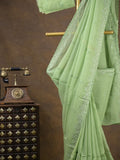 Organza fancy saree light pista green color allover embroidered motifs & cutwork border with running pallu and self blouse