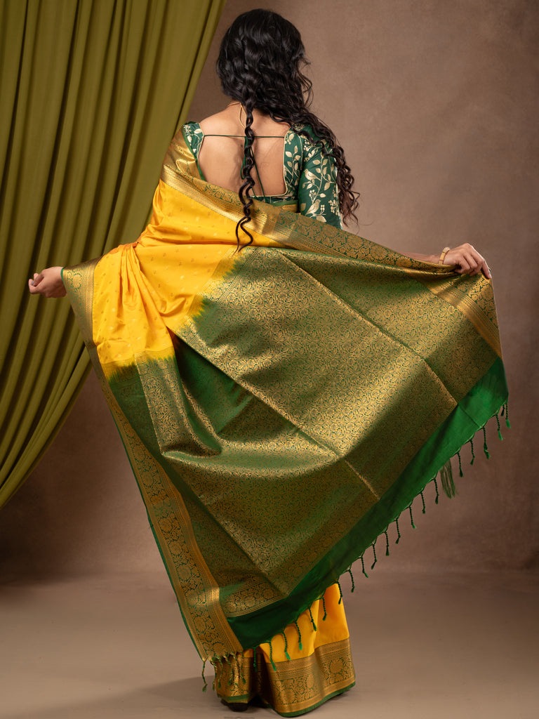 Kanchi pattu saree golden yellow color allover zari motifs & zari border with rich pallu and contrast plain blouse