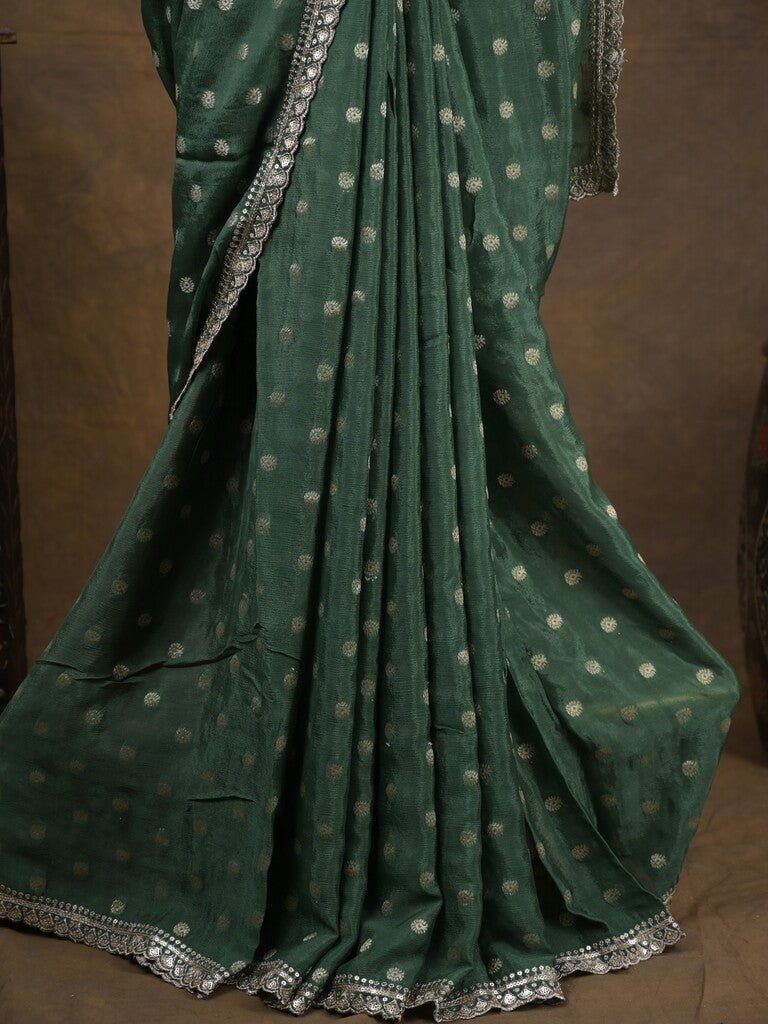 Chinnon fancy saree dark green color allover motifs & embroidery border with running pallu and contrast blouse
