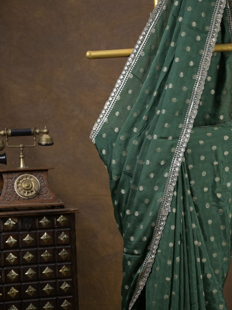 Chinnon fancy saree dark green color allover motifs & embroidery border with running pallu and contrast blouse