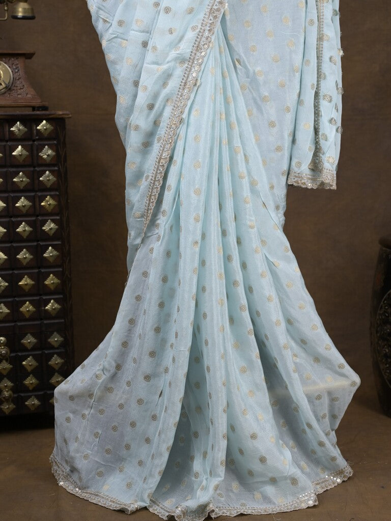 Chinnon fancy saree pastel blue color allover motifs & embroidery border with running pallu and contrast blouse