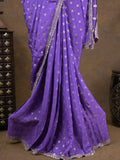 Chinnon fancy saree lavender color allover motifs & embroidery border with running pallu and contrast blouse