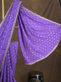 Chinnon fancy saree lavender color allover motifs & embroidery border with running pallu and contrast blouse