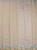 Kota fancy sarees in light beige color allover motifs with zari border and matching blouse