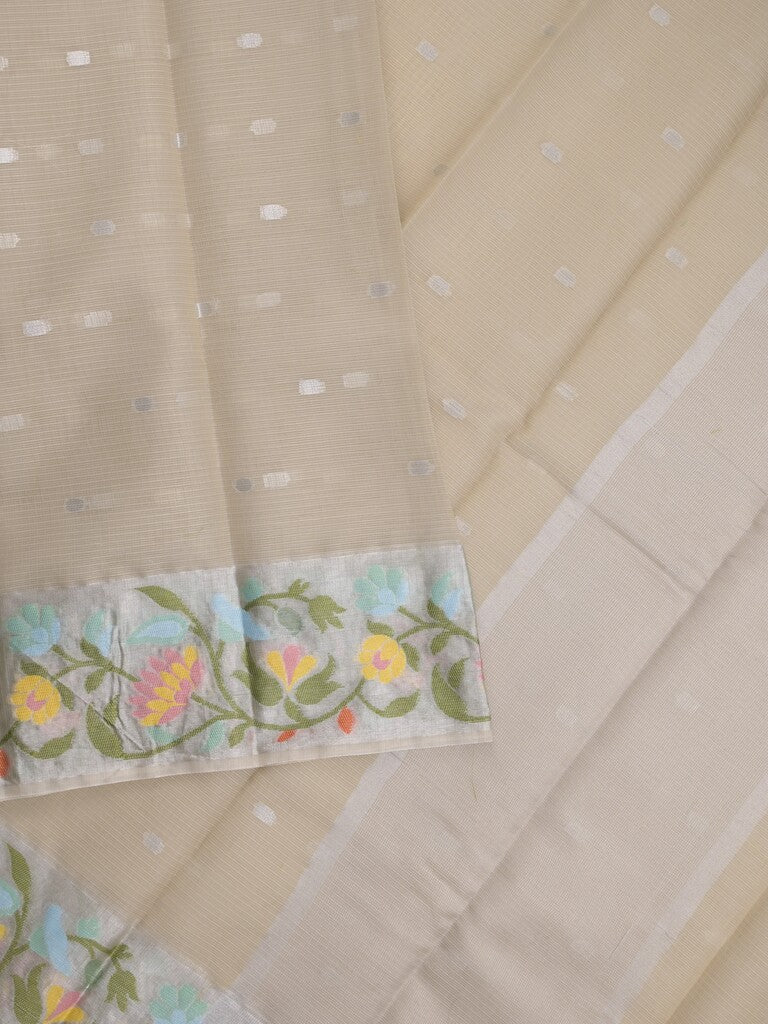 Kota fancy sarees in light beige color allover motifs with zari border and matching blouse