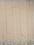 Kota fancy sarees in light beige color allover motifs with zari border and matching blouse
