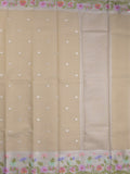Kota fancy sarees in light beige color allover motifs with zari border and matching blouse