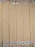 Kota fancy sarees in light beige color allover motifs with zari border and matching blouse