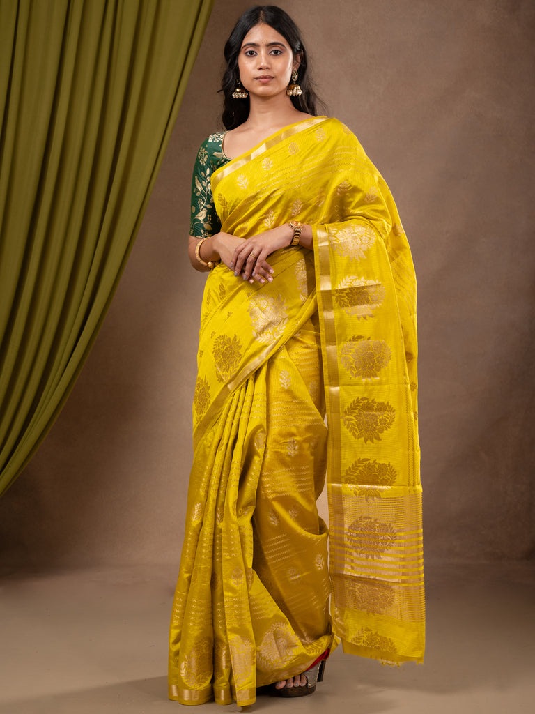 Dupion fancy saree lemon yellow color allover weaves & zari border with zari pallu and contrast blouse
