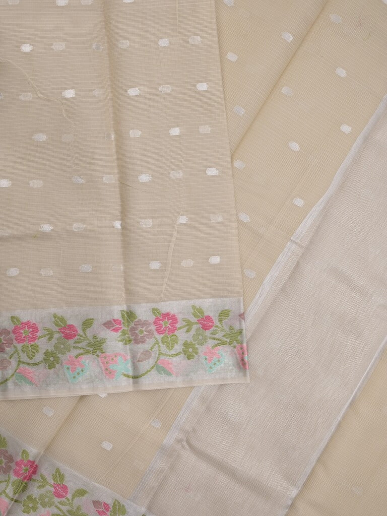 Kota fancy sarees in light beige color allover motifs with zari border and matching blouse