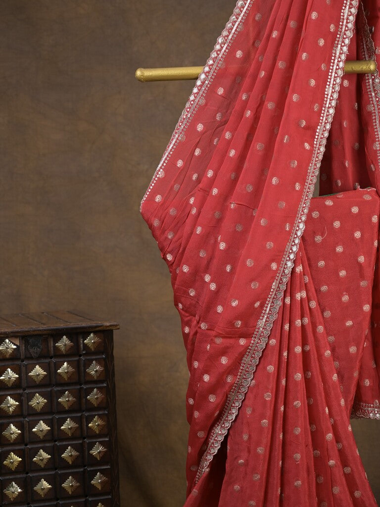 Chinnon fancy saree red color allover motifs & embroidery border with running pallu and contrast blouse