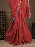 Chinnon fancy saree red color allover motifs & embroidery border with running pallu and contrast blouse