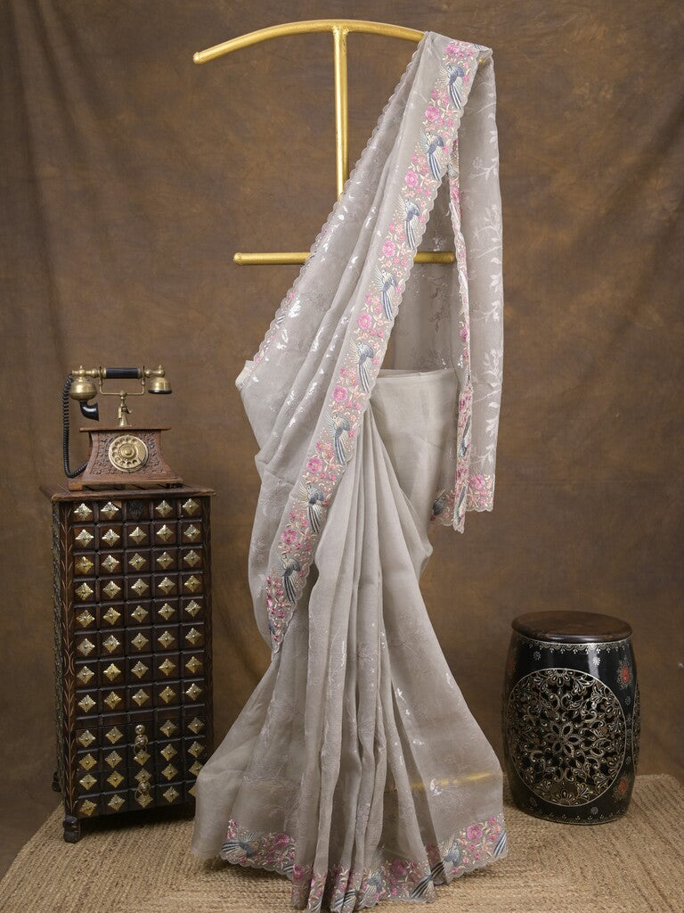 Organza fancy saree light grey color allover work & cutwork border with running pallu and plain blouse