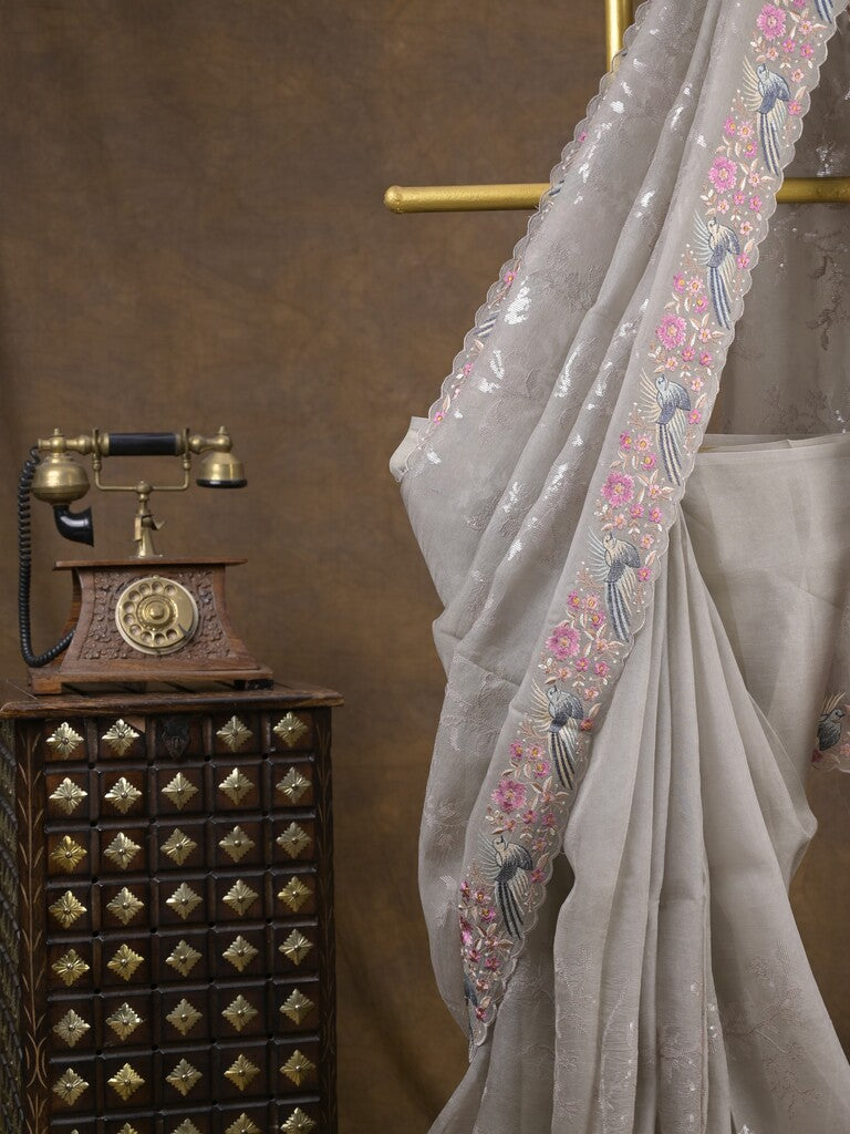 Organza fancy saree light grey color allover work & cutwork border with running pallu and plain blouse