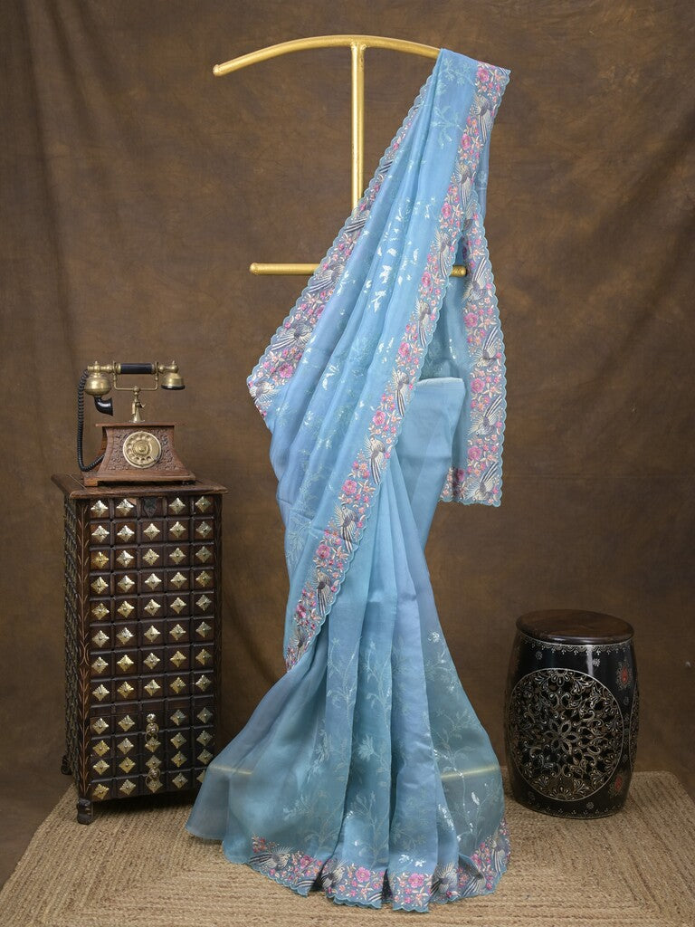Organza fancy saree sky blue color allover work & cutwork border with running pallu and plain blouse