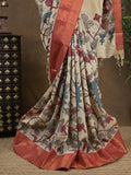 Pen kalamkari pattu cream color floral painted saree with contrast zari border and printed pallu & attached blouse