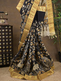 Pen kalamkari pattu black color floral painted saree with contrast zari border and printed pallu & attached blouse