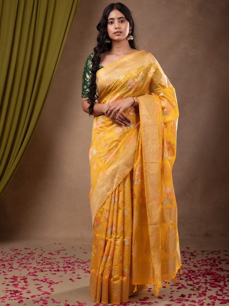 Dupion fancy saree yellow color allover weaves & zari border with zari pallu and plain self blouse