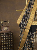 Pen kalamkari pattu black color floral painted saree with contrast zari border and printed pallu & attached blouse