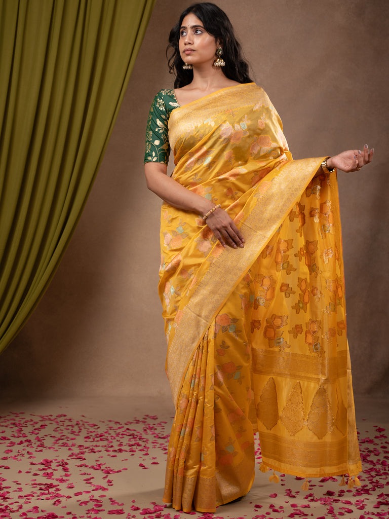 Dupion fancy saree yellow color allover weaves & zari border with zari pallu and plain self blouse