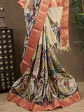 Pen kalamkari pattu cream color floral painted saree with contrast zari border and printed pallu & attached blouse