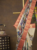 Pen kalamkari pattu cream color floral painted saree with contrast zari border and printed pallu & attached blouse