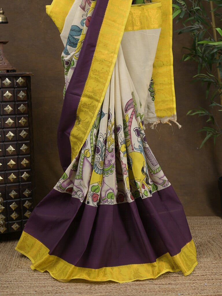 Pen kalamkari pattu cream color floral painted saree with contrast zari border and printed pallu & attached blouse