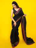 Black color mul cotton one minute saree with allover prints & contrast border and attached printed blouse