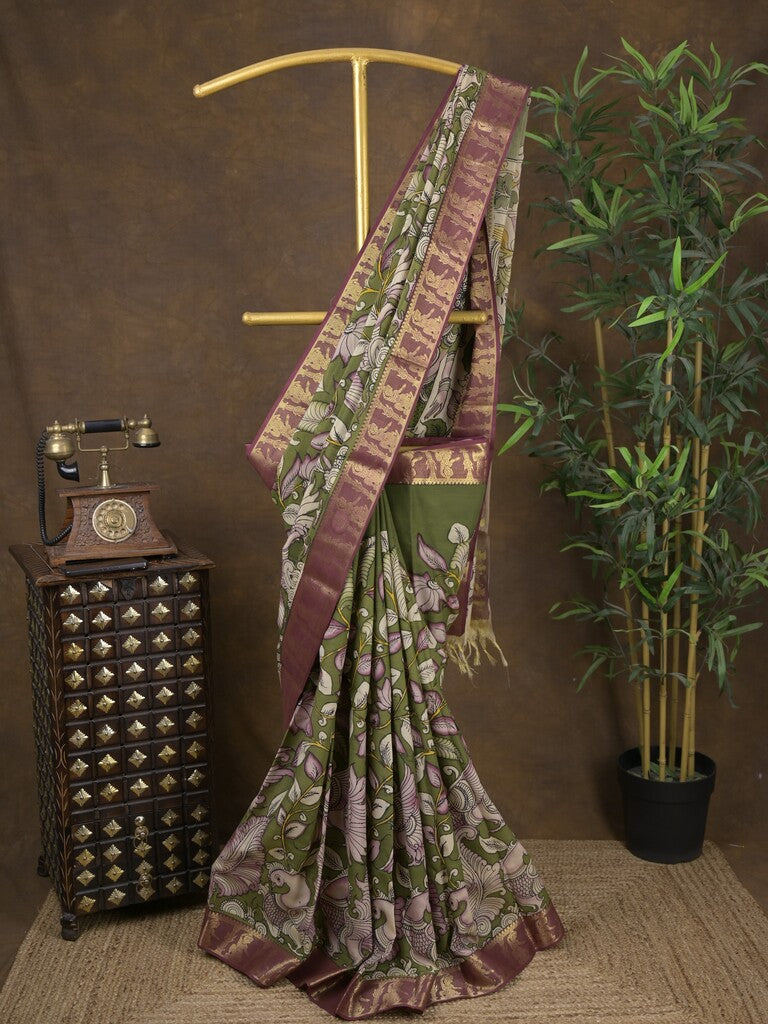 Pen kalamkari pattu olive green color floral painted saree with contrast zari border and printed pallu & attached blouse