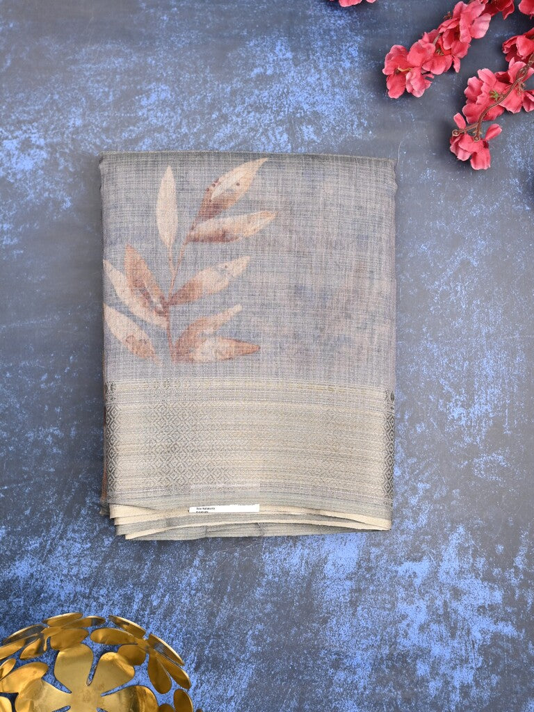 Jute tissue fancy saree grey color allover prints & zari border with short pallu and plain blouse