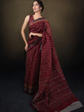 Maroon color mul cotton one minute saree with allover prints & contrast border and attached printed blouse