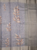 Jute tissue fancy saree grey color allover prints & zari border with short pallu and plain blouse