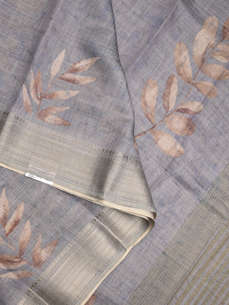 Jute tissue fancy saree grey color allover prints & zari border with short pallu and plain blouse