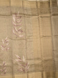 Jute tissue fancy saree snuff color allover prints & zari border with short pallu and plain blouse