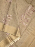 Jute tissue fancy saree snuff color allover prints & zari border with short pallu and plain blouse