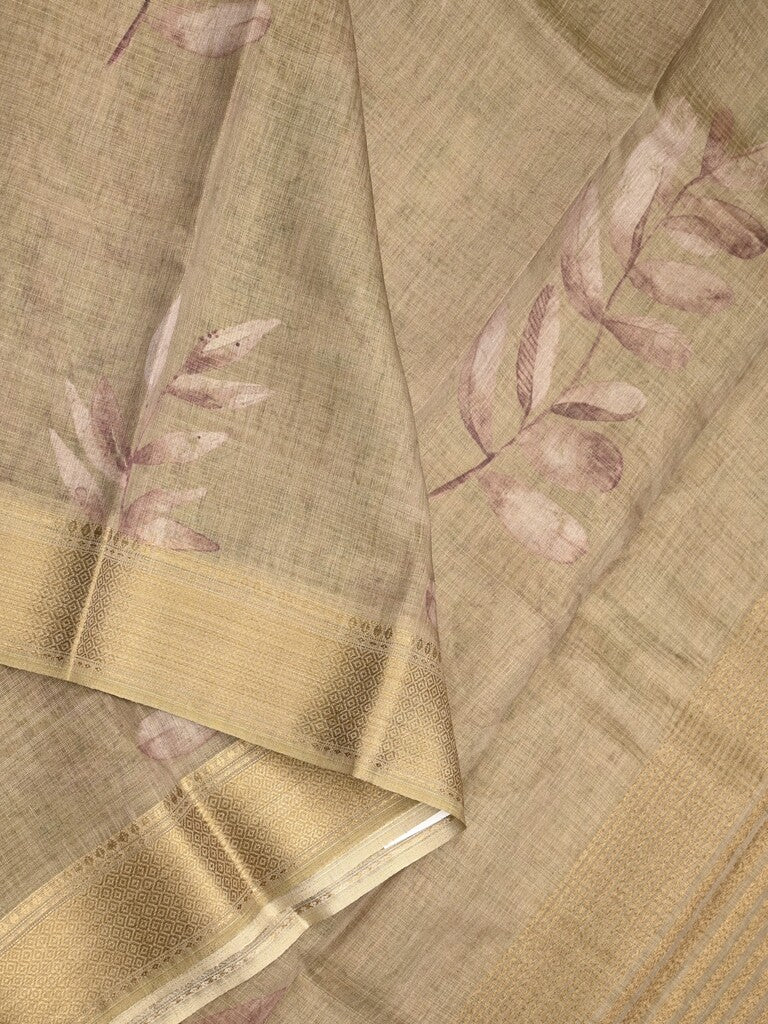 Jute tissue fancy saree snuff color allover prints & zari border with short pallu and plain blouse