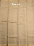 Jute tissue fancy saree snuff color allover prints & zari border with short pallu and plain blouse