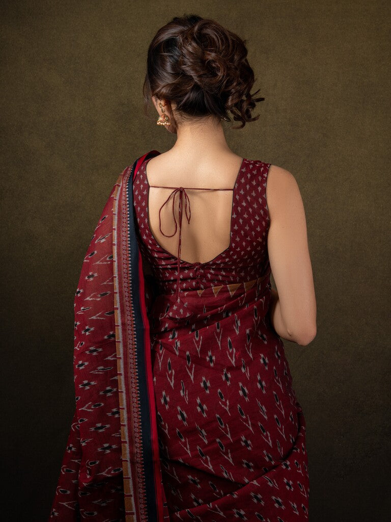 Maroon color mul cotton one minute saree with allover prints & contrast border and attached printed blouse