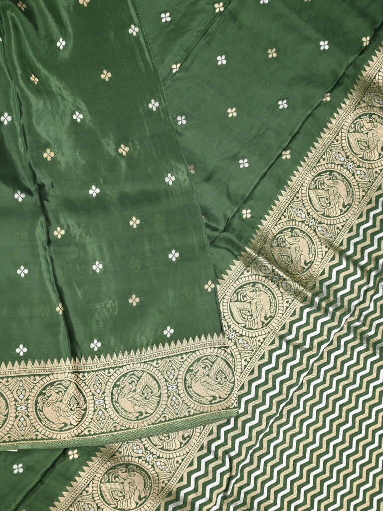 Tabby silk fancy saree bottle green color allover zari motifs & zari border with rich pallu and plain blouse