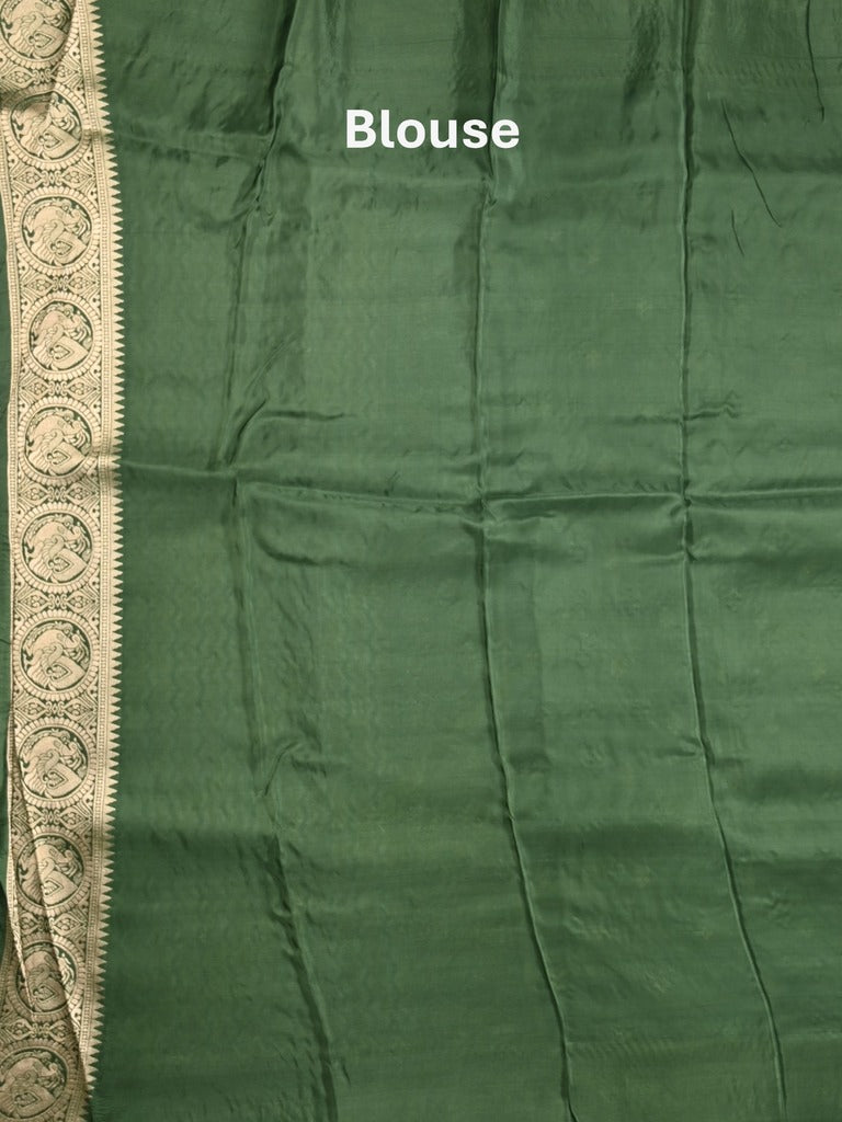 Tabby silk fancy saree bottle green color allover zari motifs & zari border with rich pallu and plain blouse