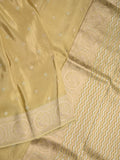 Tabby silk fancy saree beige color allover zari motifs & zari border with rich pallu and plain blouse